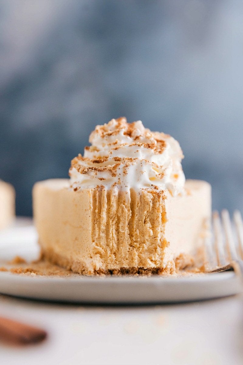 Image of No-Bake Pumpkin Cheesecake slice with a bite out of it