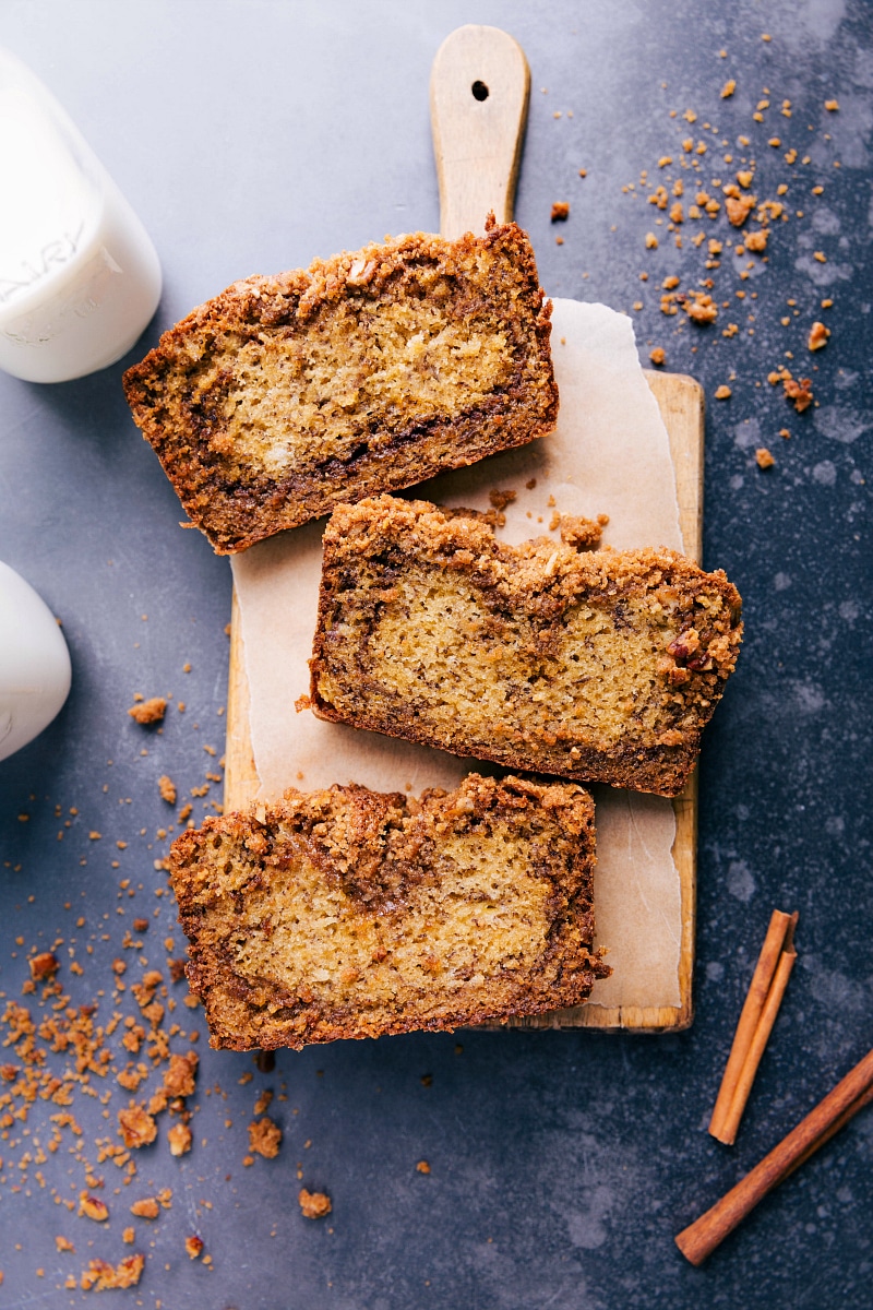 The best cinnamon banana bread cut into slices revealing a delicious cinnamon swirl and moist texture.
