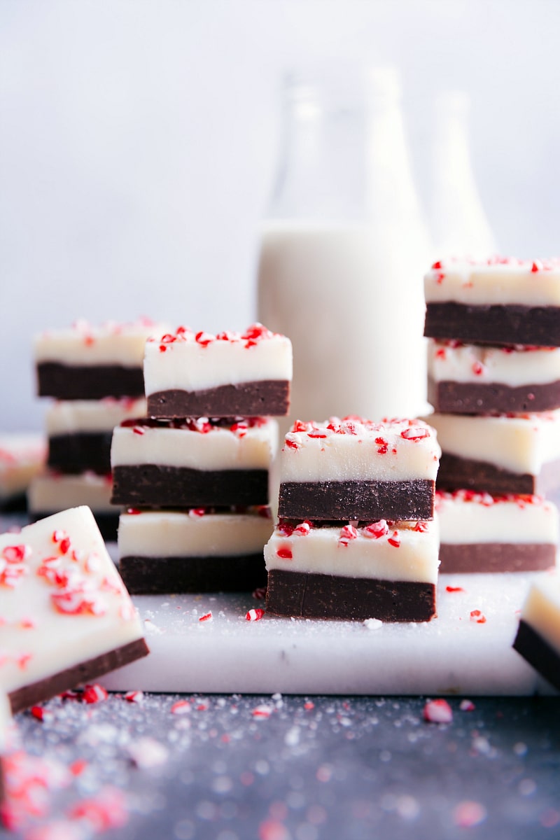 Peppermint Fudge, cut into squares and stacked on top of each other.