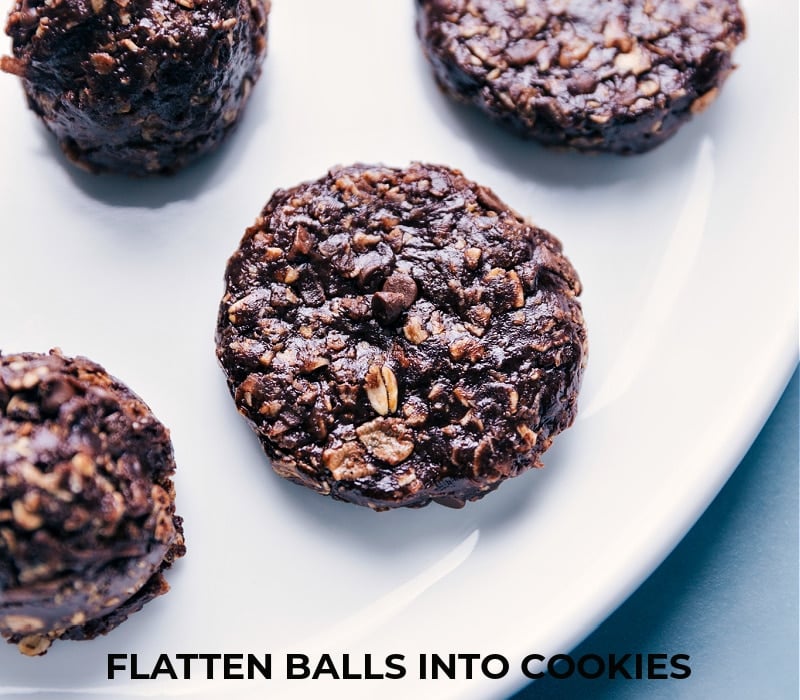 Chocolate-Peanut Butter Breakfast Cookies being flattened into cookies