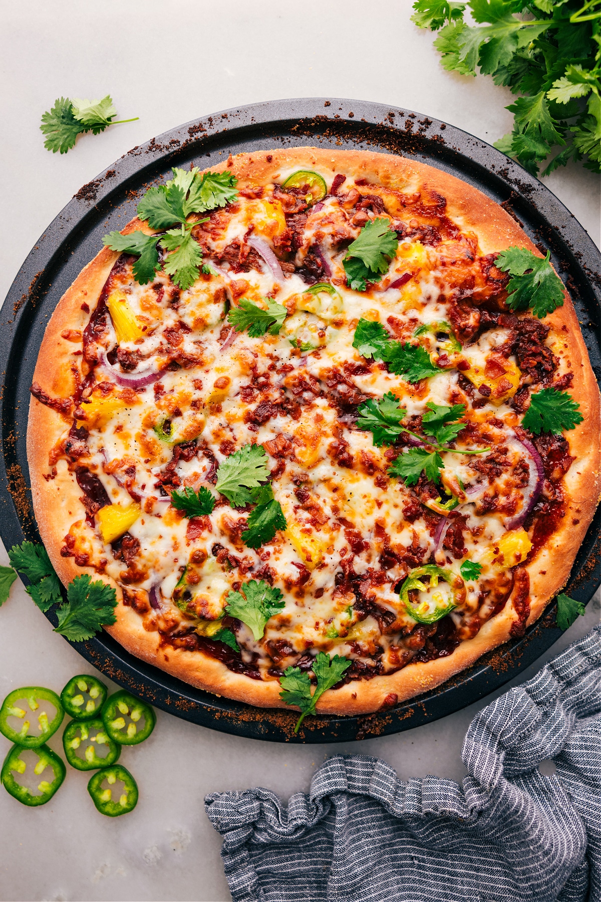 The Best BBQ Chicken Pizza BBQ Chicken Pizza just out of the oven and ready to enjoy.