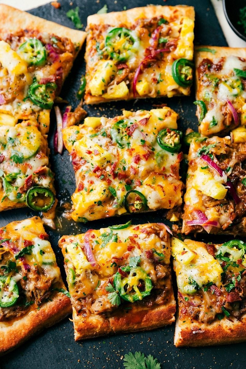 Overhead view of BBQ Pulled Pork Pizza, cut into serving-sized squares