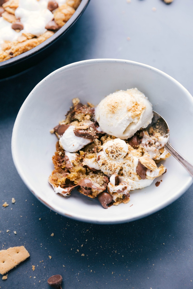 Overhead image of S'mores Pizookie in a bowl, with ice cream.