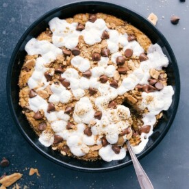 Freshly baked s'mores pizookie, warm and gooey, inviting a sweet dessert indulgence.