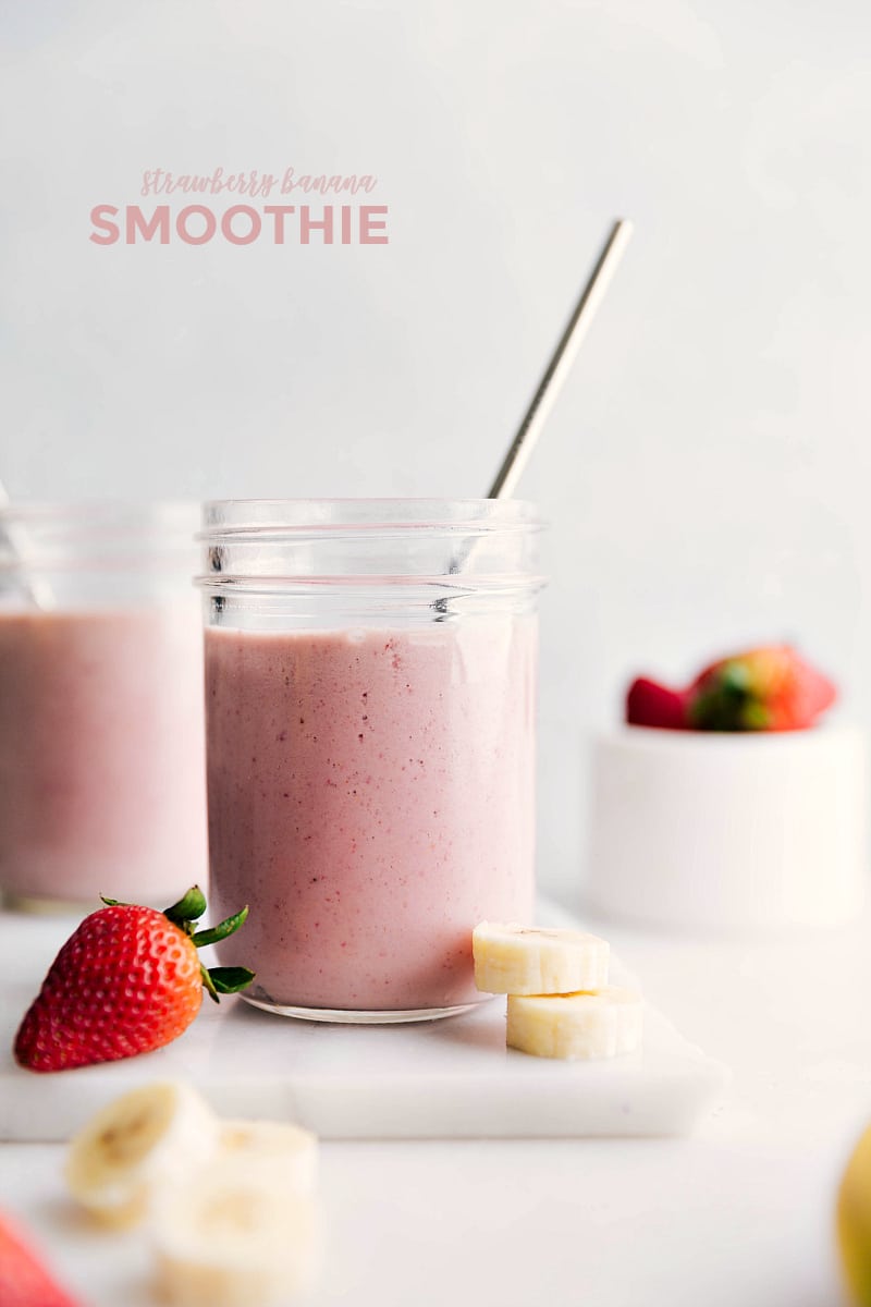 This Strawberry Banana Smoothie takes mere minutes to whip together and only requires five ingredients: frozen strawberries, frozen banana, milk, yogurt, and honey. This smoothie is healthy, filling, creamy, and flavorful! Recipe via ChelseasMessyApron.com #strawberry #banana #smoothie #easy #quick #healthy #fruit Up-close photo of finished Strawberry Banana Smoothie.