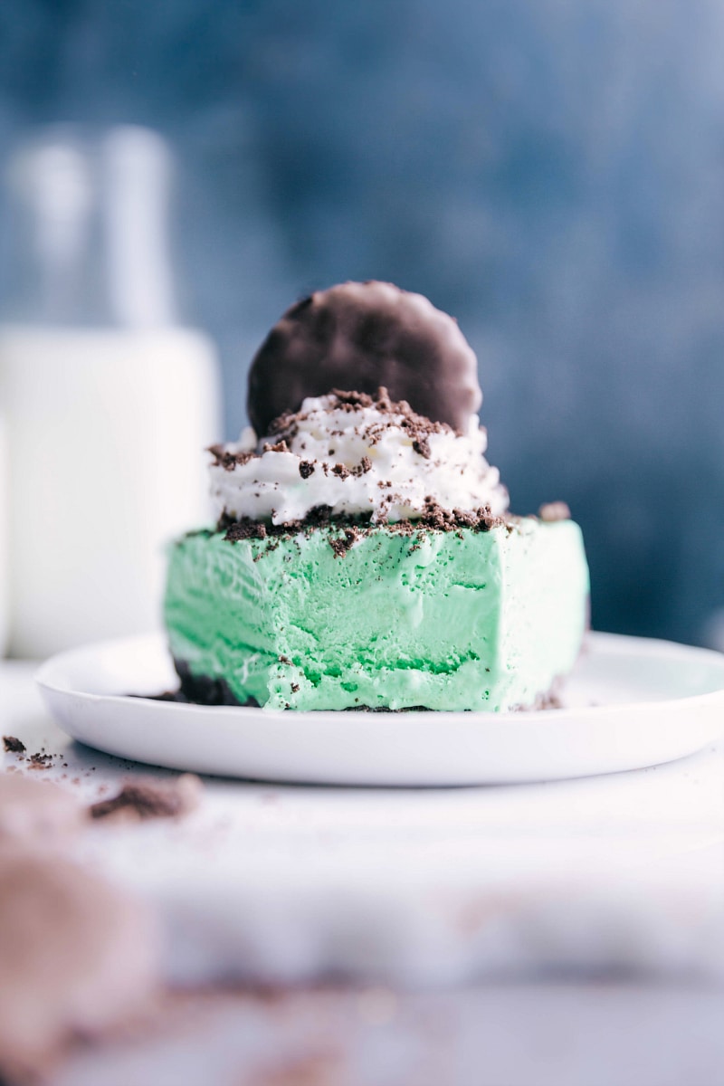View of a slice of Thin Mint Cheesecake, with a bite taken out of it.