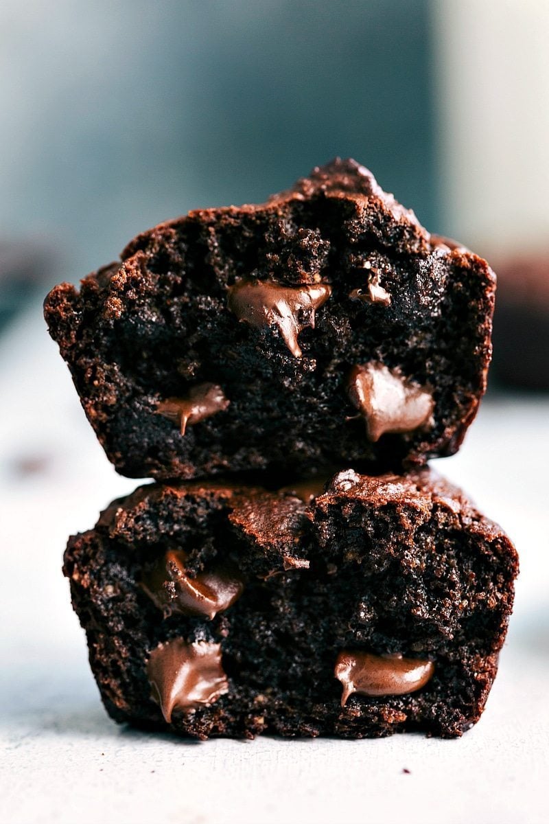 Image of Chocolate Peanut Butter Muffins cut in half and stacked.