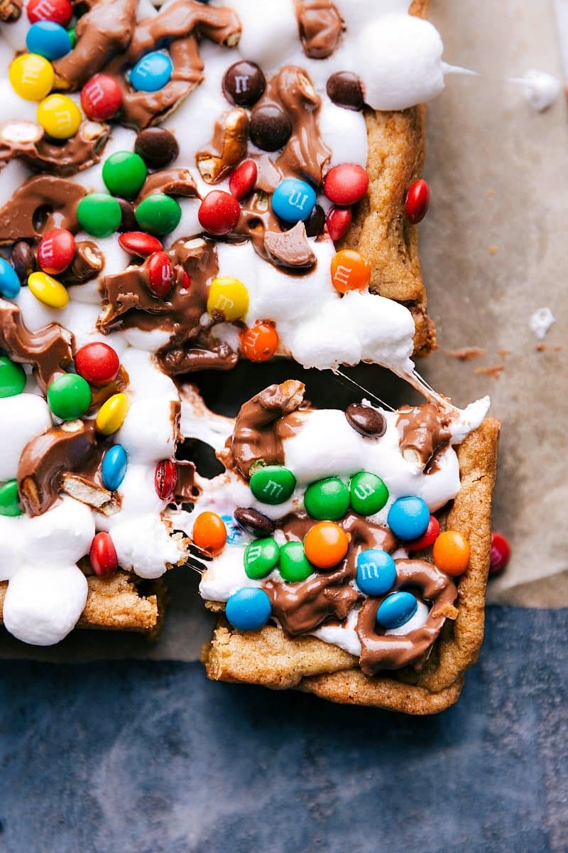 Overhead image of Funfetti Bars with one piece cut out, ready to be eaten.