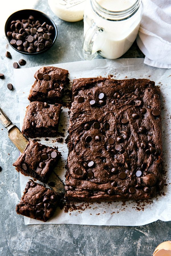 Applesauce Brownies being cut into squares