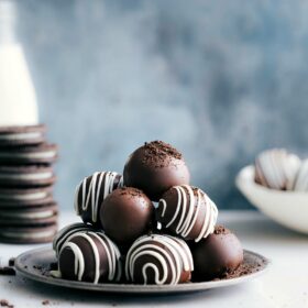 Oreo Balls, piled up on a plate.