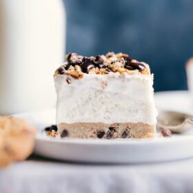 Cookie dough ice cream bar on a plate ready for a sweet treat.