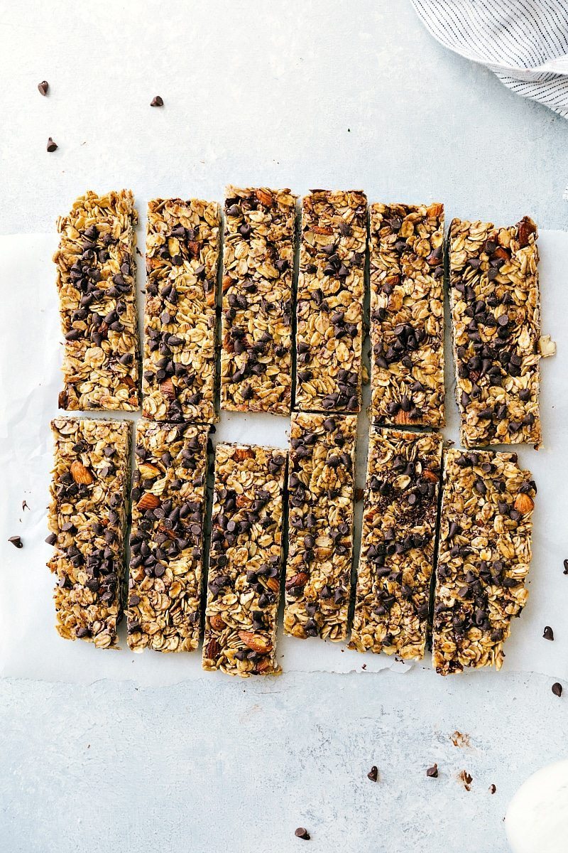 Delicious homemade granola bars, full of chocolate chips, cut into portions, and ready to be enjoyed.