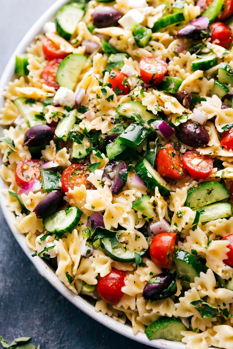 Up-close image of the Greek Pasta Salad, showing all the components with dressing added.