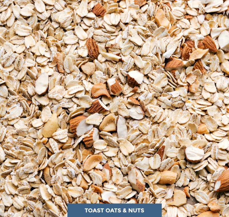 Close-up image of the oats and nuts, ready to toast in the oven.