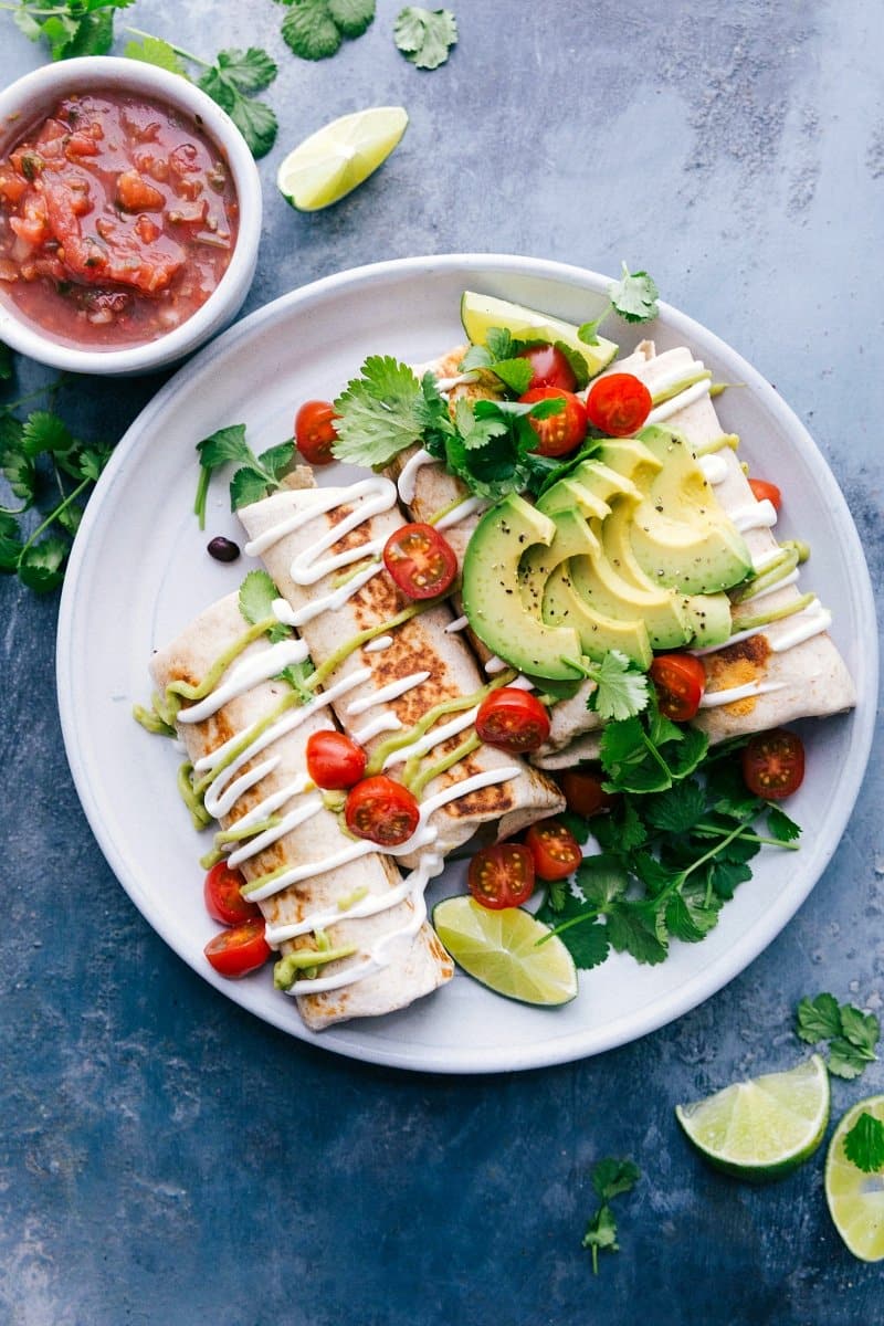 Overhead view of Healthy Burritos with a bowl of salsa on the side.