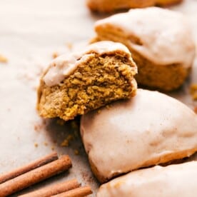 Pumpkin scones with a delectable bite missing.