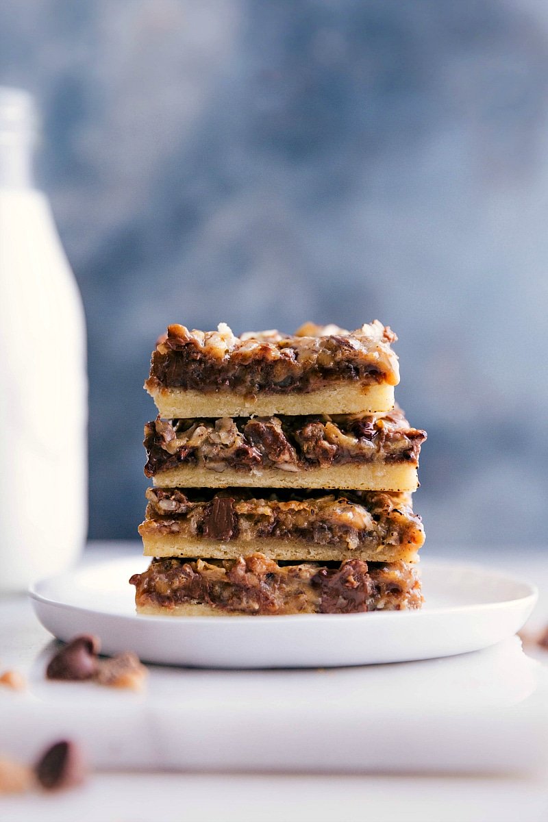 Stacked seven-layer pumpkin bars, a delicious treat ready to be enjoyed.