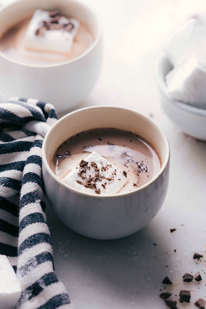 Overhead image of Homemade Marshmallows in a cup of hot chocolate-- perfect for a cold day.