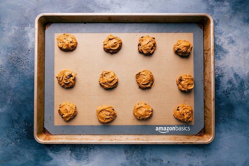 Overhead image of the pumpkin Cake Mix Pumpkin Cookie dough on a sheet pan, ready to be baked