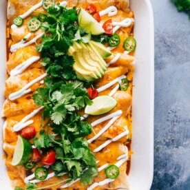 Sweet potato enchiladas with a delectable filling, topped with melted cheese.