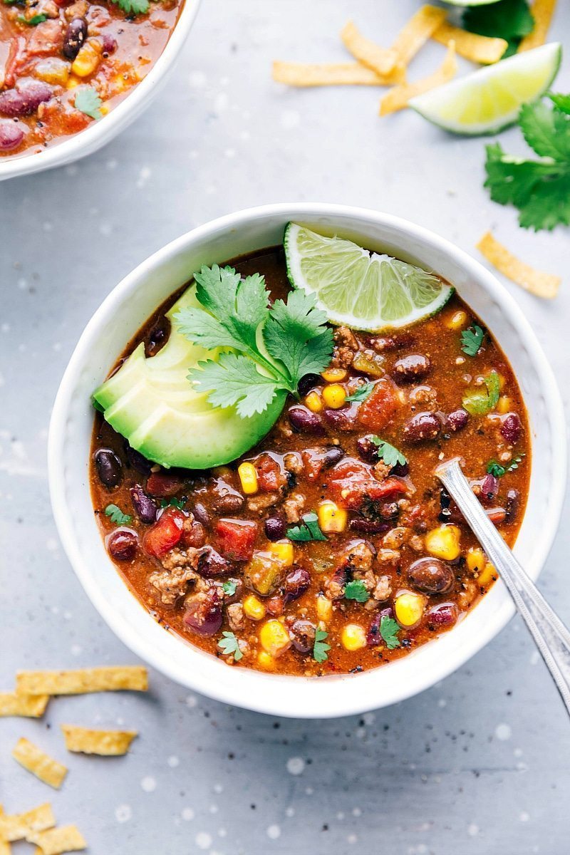 The best ever taco chili made in 30 minutes or less in the instant pot (pressure cooker)! Plus instructions for cooking this soup in a crockpot or on the stovetop. chelseasmessyapron.com