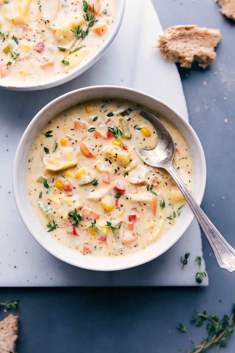 Creamy chicken tortellini soup, healthy and flavor-packed, ready to enjoy with a side of bread.