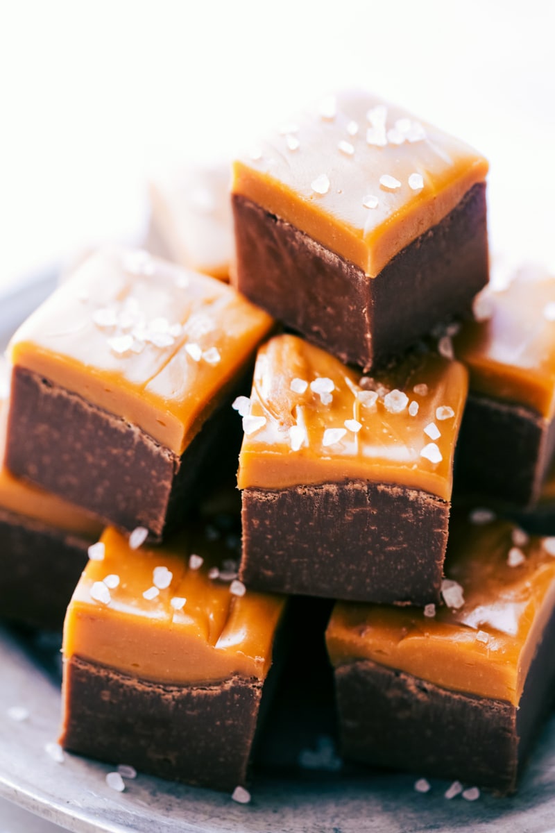 Microwave Fudge pieces stacked on top of each other ready to be eaten.