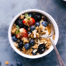Almond granola in a yogurt bowl, a scrumptious breakfast ready to be enjoyed.
