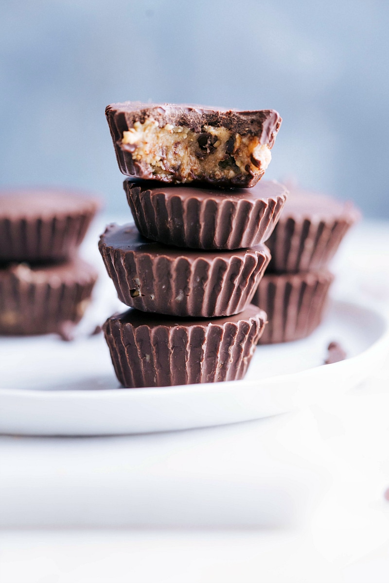 Photo of several Healthy Cookie Dough Cups stacked on a plate