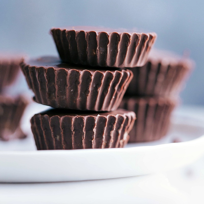 View of three Healthy Cookie Dough Cups stacked on a plate