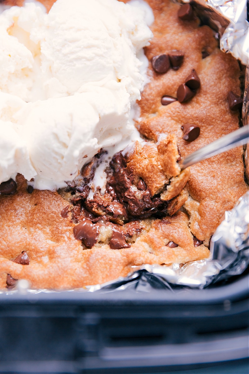 Air Fryer Pizookie topped with ice cream.
