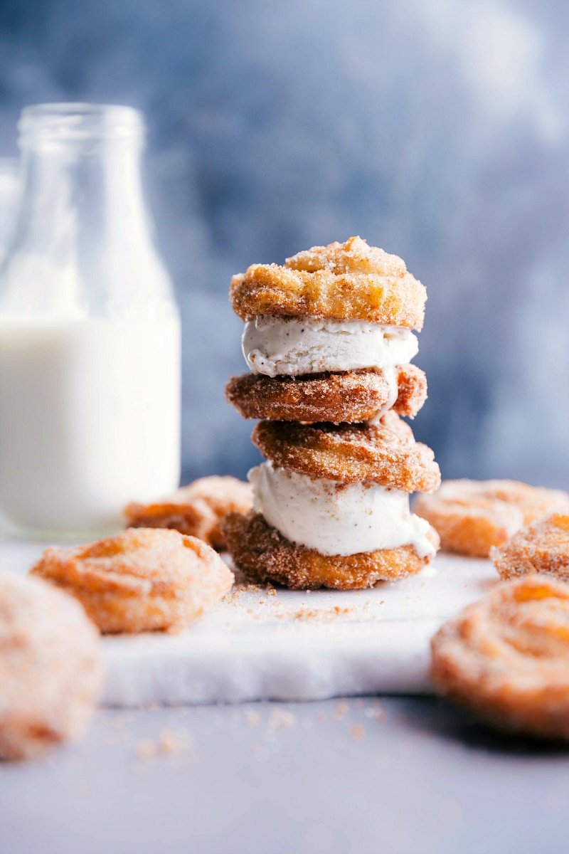 Two stacked golden churro ice cream sandwiches ready for indulgence.