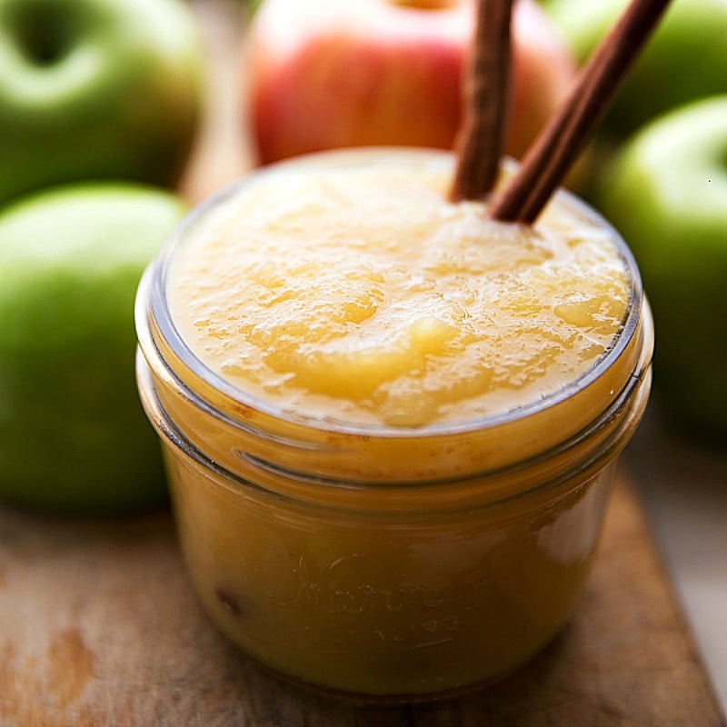 Applesauce, a key ingredient for the applesauce cake recipe, in a container.