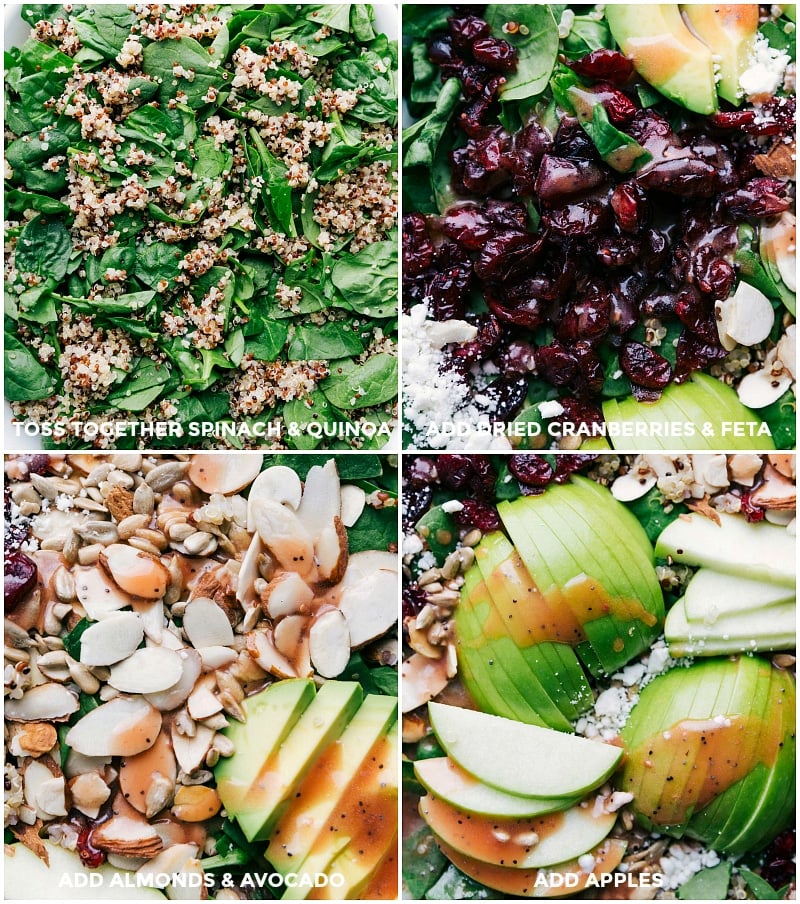 Quinoa, cranberries, feta, almonds, avocado, and apples on a bed of spinach.