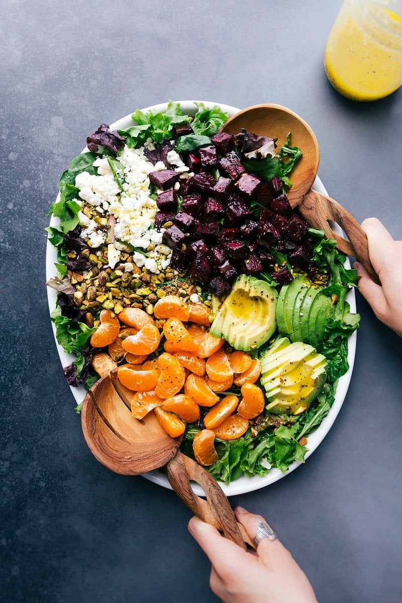 Beet and goat cheese salad displaying an array of colorful ingredients for a healthy meal.