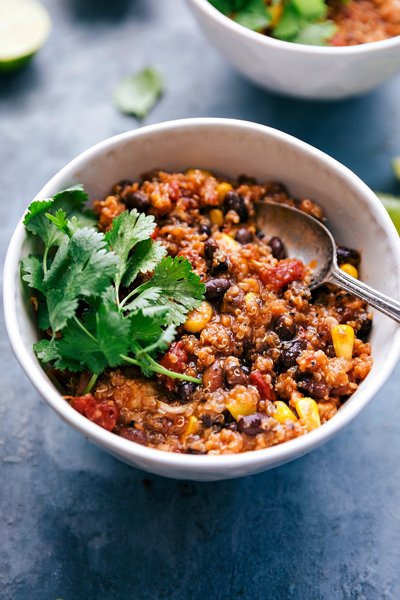 Image of the Crockpot Quinoa Chili in a bowl with cilantro ready to eat.