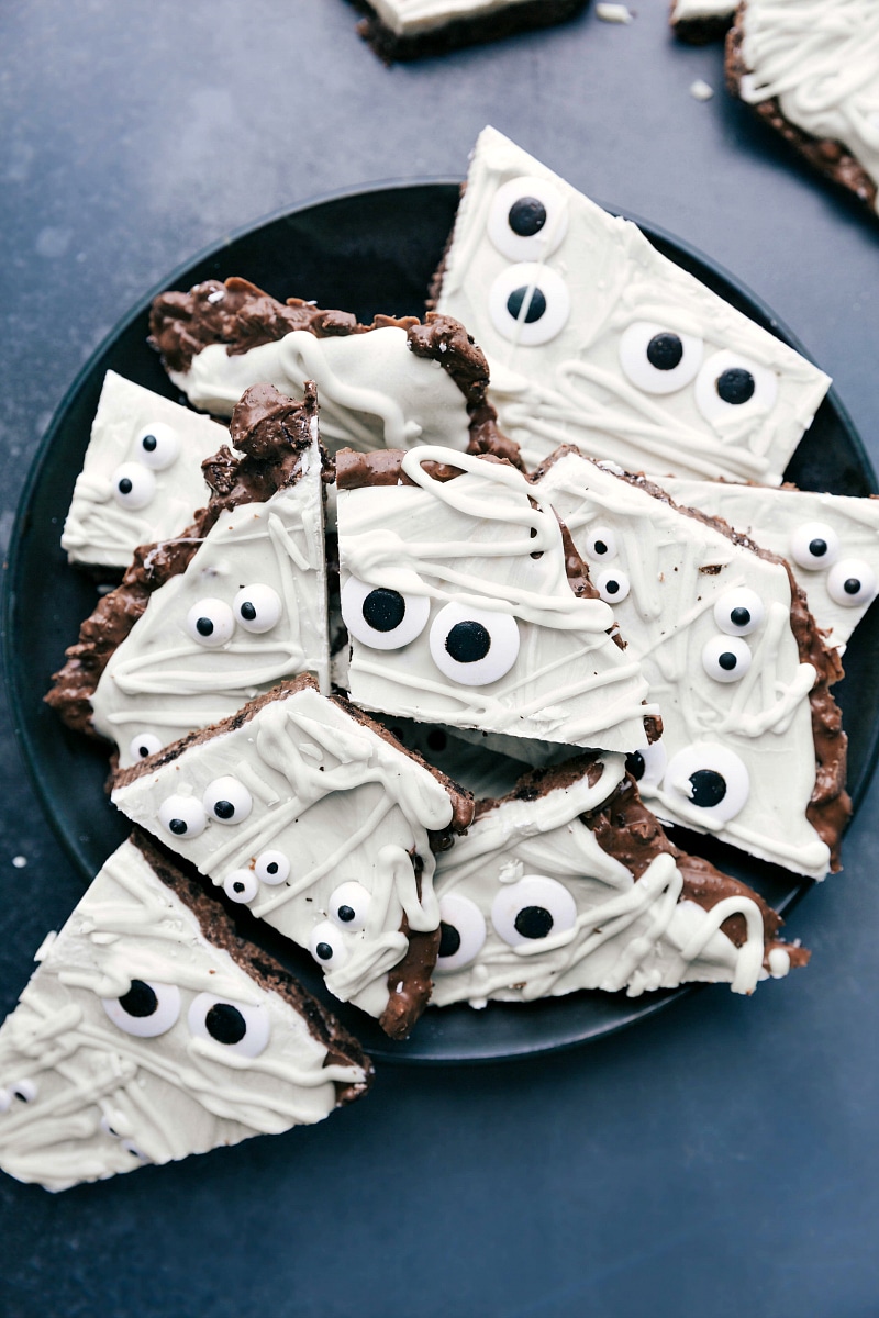 A plate displaying mummy bark, a cute and delicious festive treat, perfect for Halloween or other special occasions.