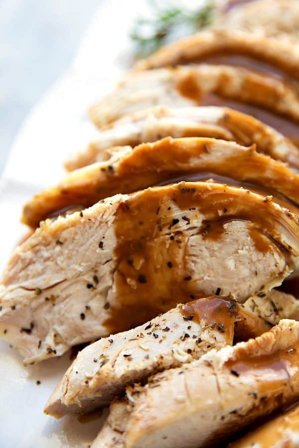 The most tender and deliciously seasoned crockpot turkey breast. Perfect for smaller holiday get togethers or to have turkey ready for lunches and salads during the week. | chelseasmessyapron.com