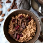 Overnight oatmeal flavored to taste like chocolate-covered almonds. Add in some dried cranberries and enjoy a delicious, quick, & easy seasonal breakfast!