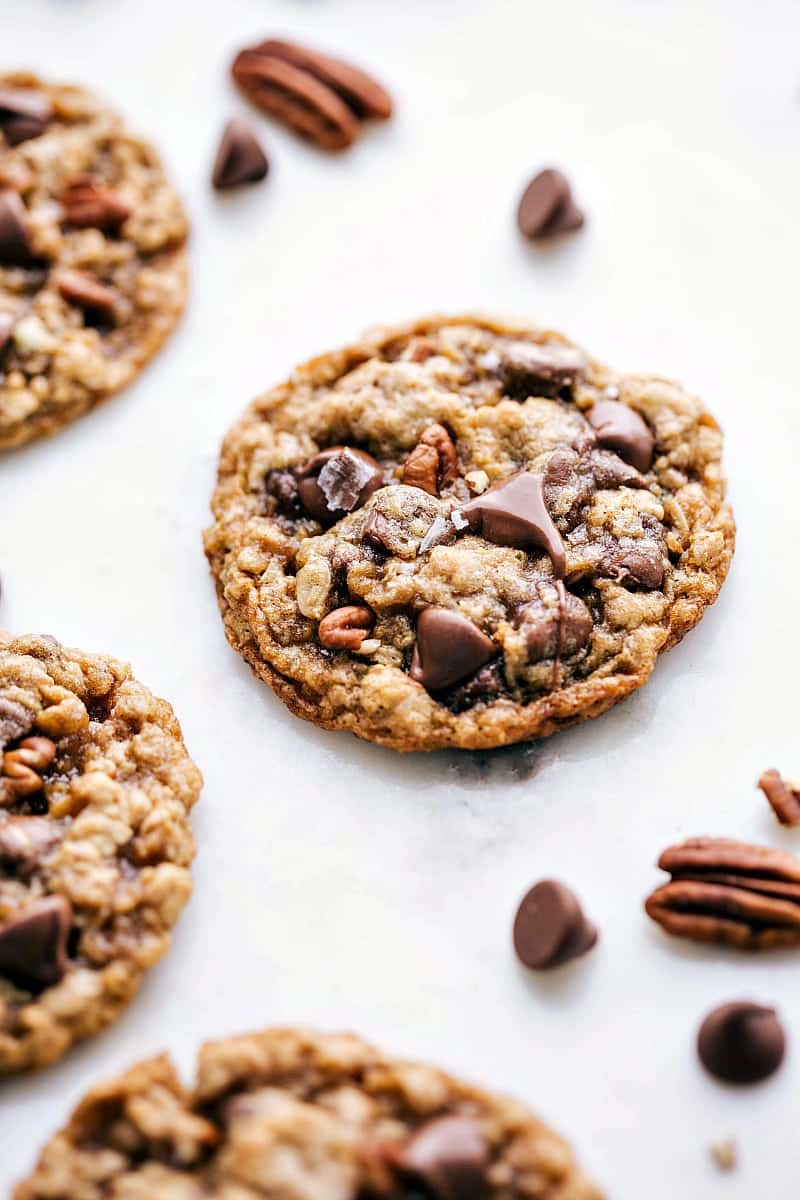 Up-close and overhead shot of an Oatmeal Pecan Cookie - crisp edges and soft and chewy center.