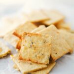 Simple and quick (15 minutes to make) homemade parmesan-herb crackers. Perfect for entertaining and snacking!