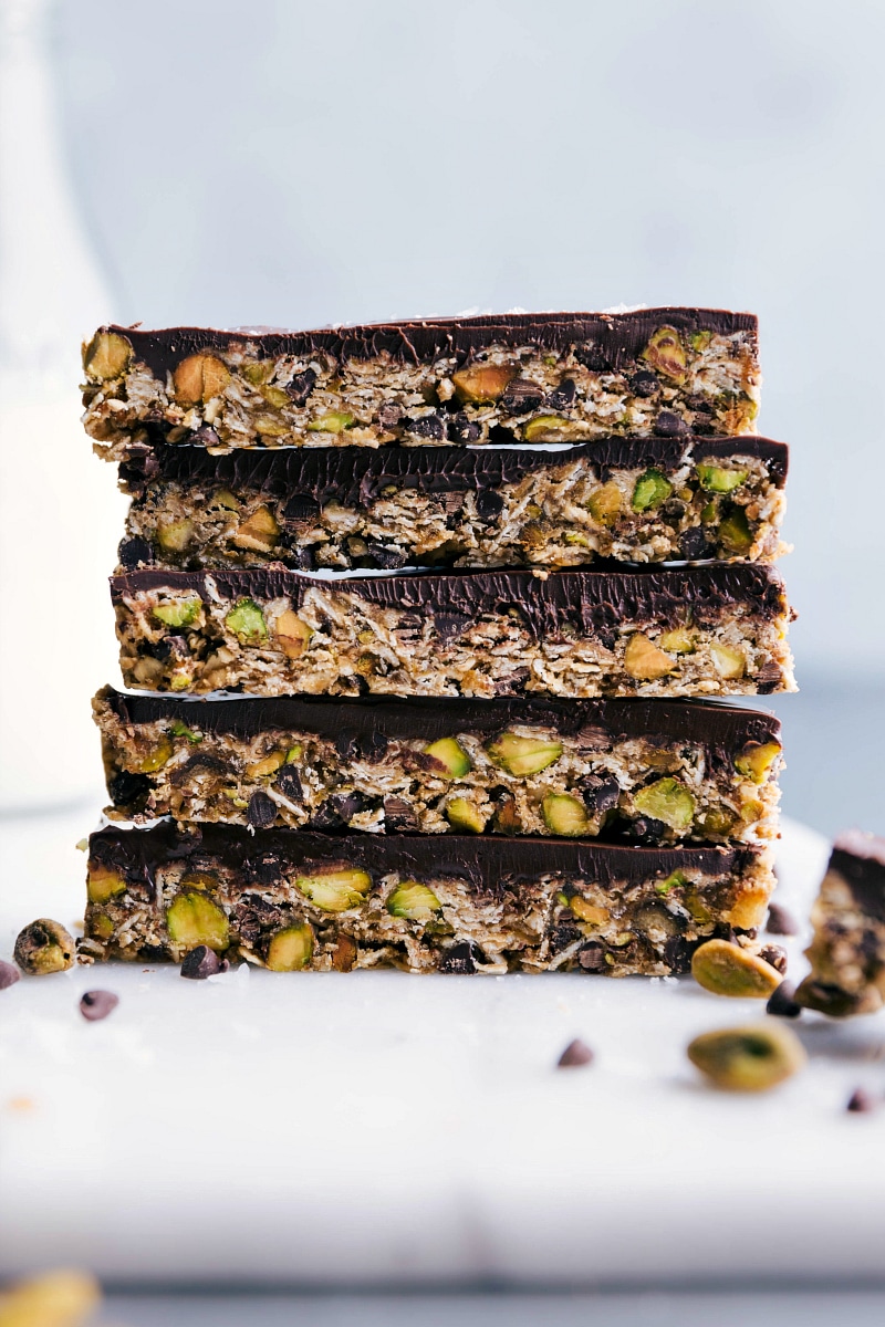 A finished granola bar stacked on top of others, showcasing their healthy and delicious interior.