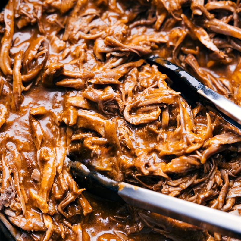 Overhead image of the saucy Cafe Rio Sweet Pork fresh out of the crockpot