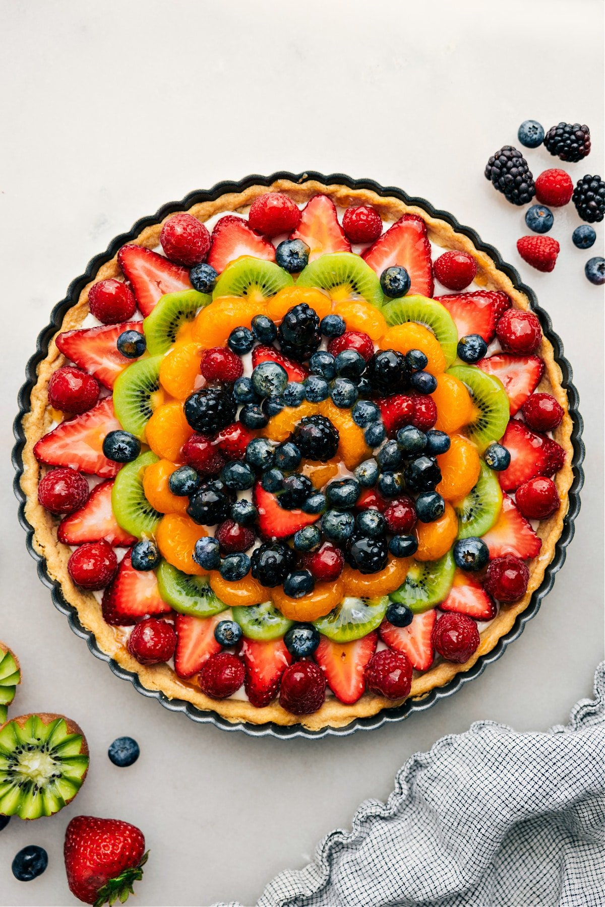 Fruit Pizza Recipe with a sweet glaze—slice and enjoy!