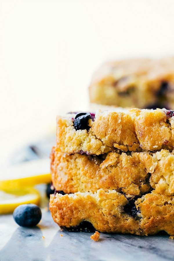 Up-close image of Lemon Blueberry Bread slices stacked on top of each other.