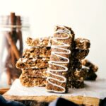 Easy to make (no baking!) soft and chewy granola bars made to taste like an iced oatmeal cookie.