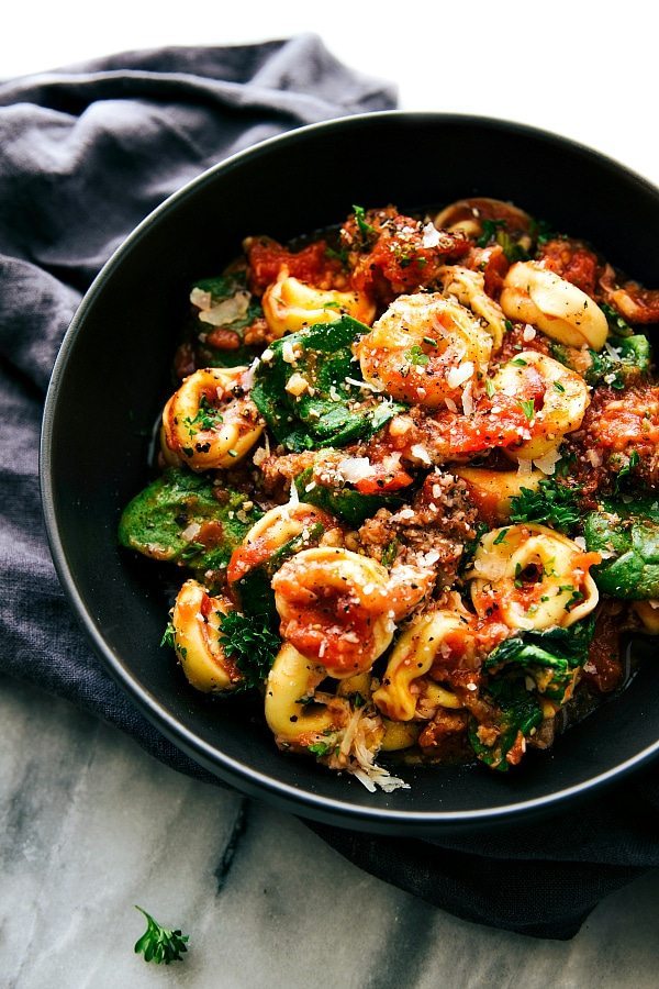 A super easy, 15-minute prep, ONE SKILLET tomato tortellini with sausage. This is an easy family-friendly meal!