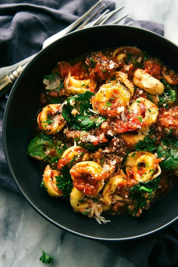 A super easy, 15-minute prep, ONE SKILLET tomato tortellini with sausage. This is an easy family-friendly meal!