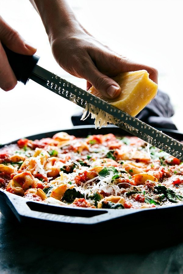 A super easy, 15-minute prep, ONE SKILLET tomato tortellini with sausage. This is an easy family-friendly meal!