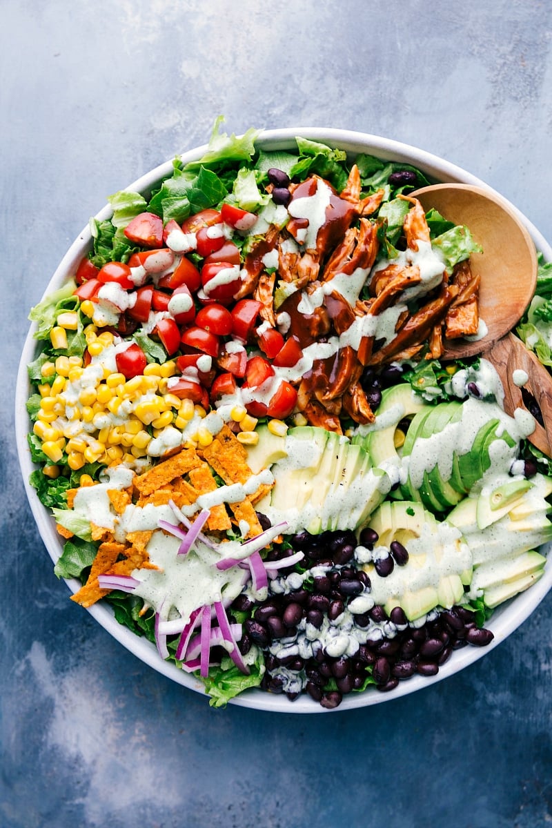 Overhead image of BBQ Chicken Salad in a bowl dressed and ready to eat.